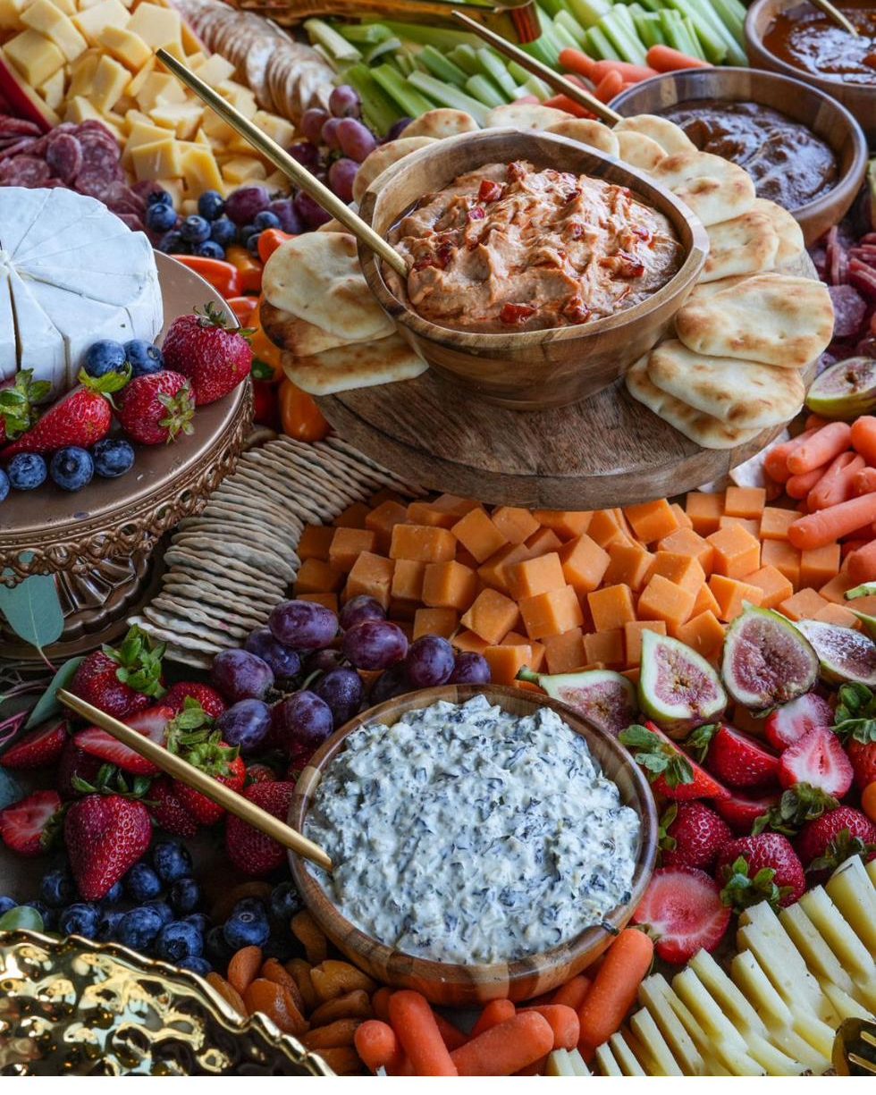 Grazing display of cheeses, charcuterie, fresh fruit and dips presented by B Hospitality Group